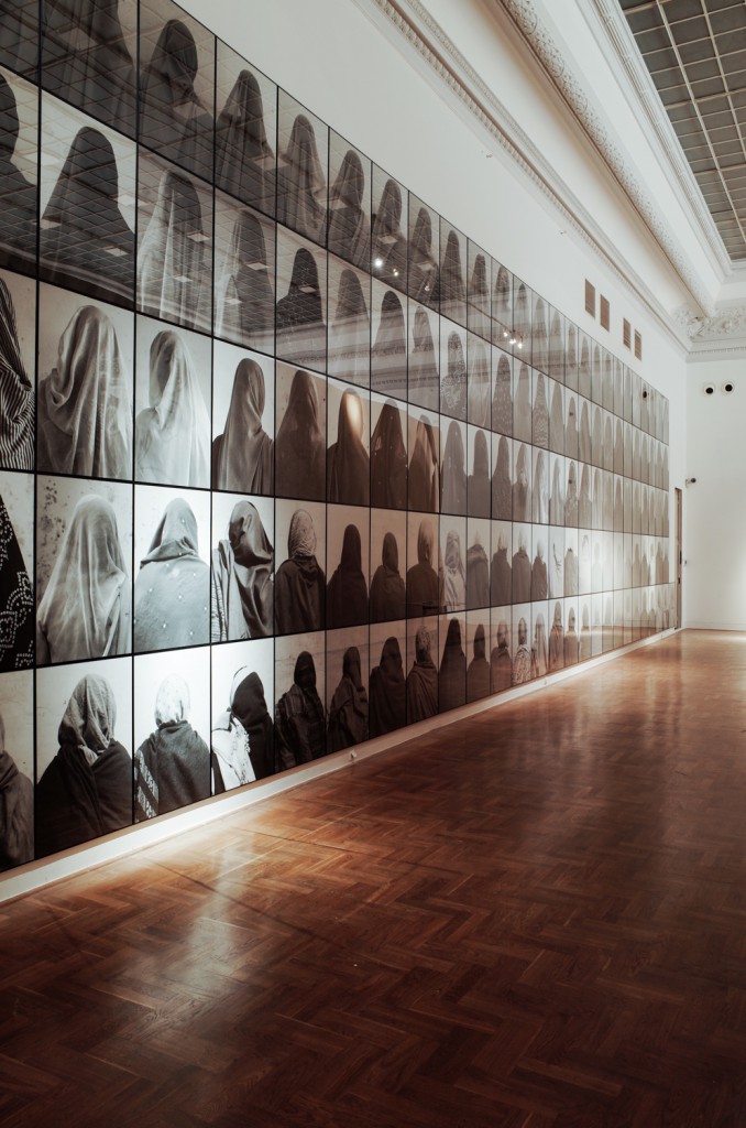 Santiago Sierra, 146 Women, 2005, installation, 146 photographs, photo by Paweł Eibel