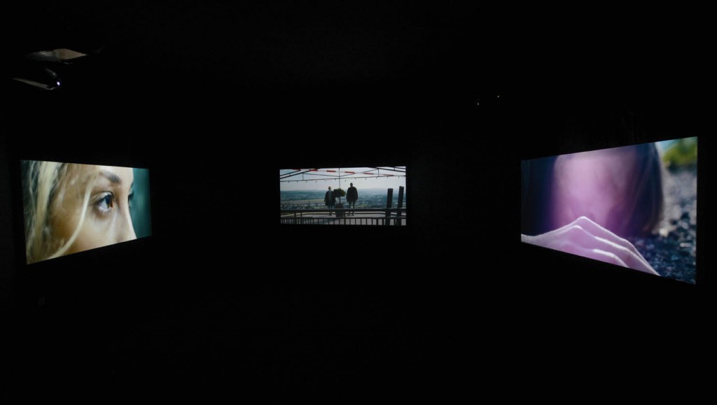 Filip Markiewicz View of the exhibition:  Journey to the End of an Identity,  2015 Full HD film installation synchronized  on 3 x projectors Format 2.35 :1, 35 minutes, variable  dimensions © Filip Markiewicz / Photo: Christian Mosa